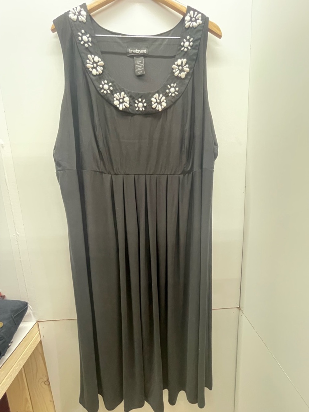Lane Bryant sleeveless dress features a decorative bead-embellished neckline